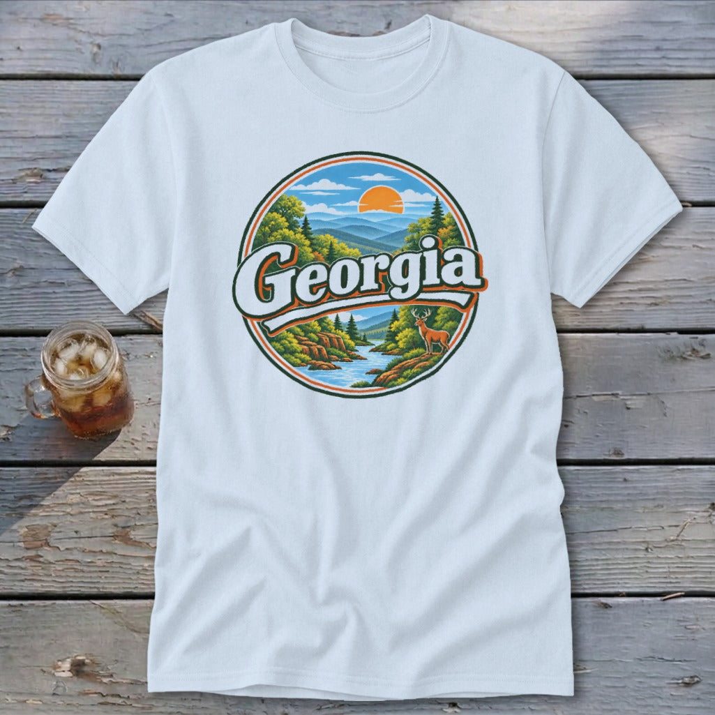 White t-shirt with a circular graphic featuring mountains, river, deer, and the word "Georgia".
