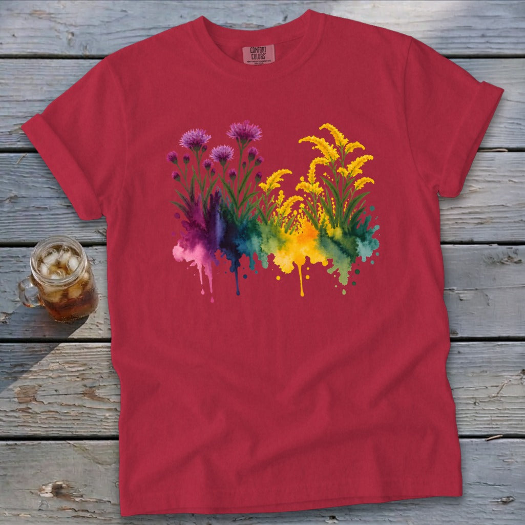 Red t-shirt with a watercolor floral design featuring purple and yellow flowers.