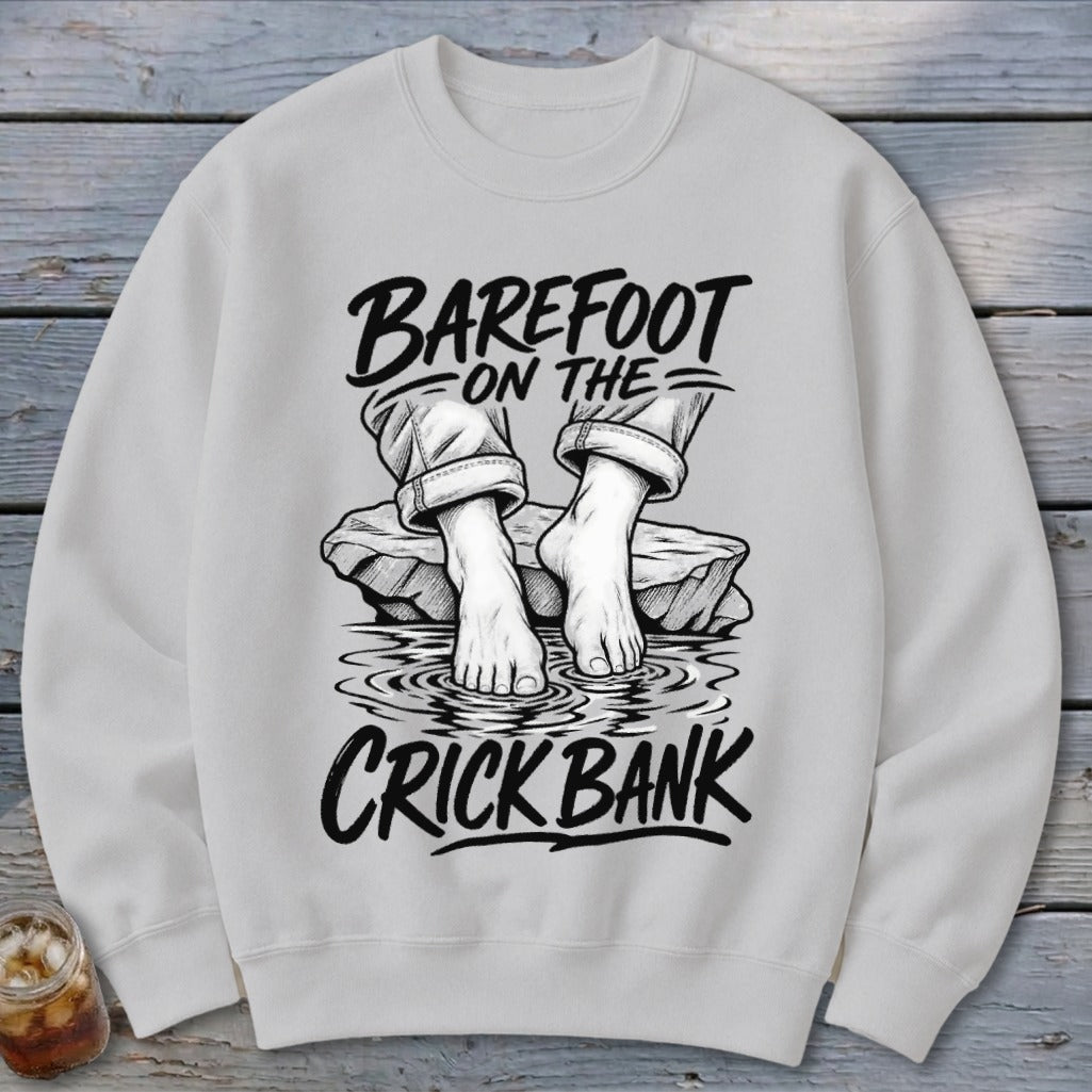 Sweatshirt with "Barefoot on the Crick Bank" text and illustration of bare feet.