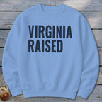 Light blue sweatshirt with "VIRGINIA RAISED" printed in dark blue on the front.