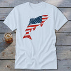 A white crewneck t-shirt featuring a distressed American flag graphic shaped like a leaping fish.