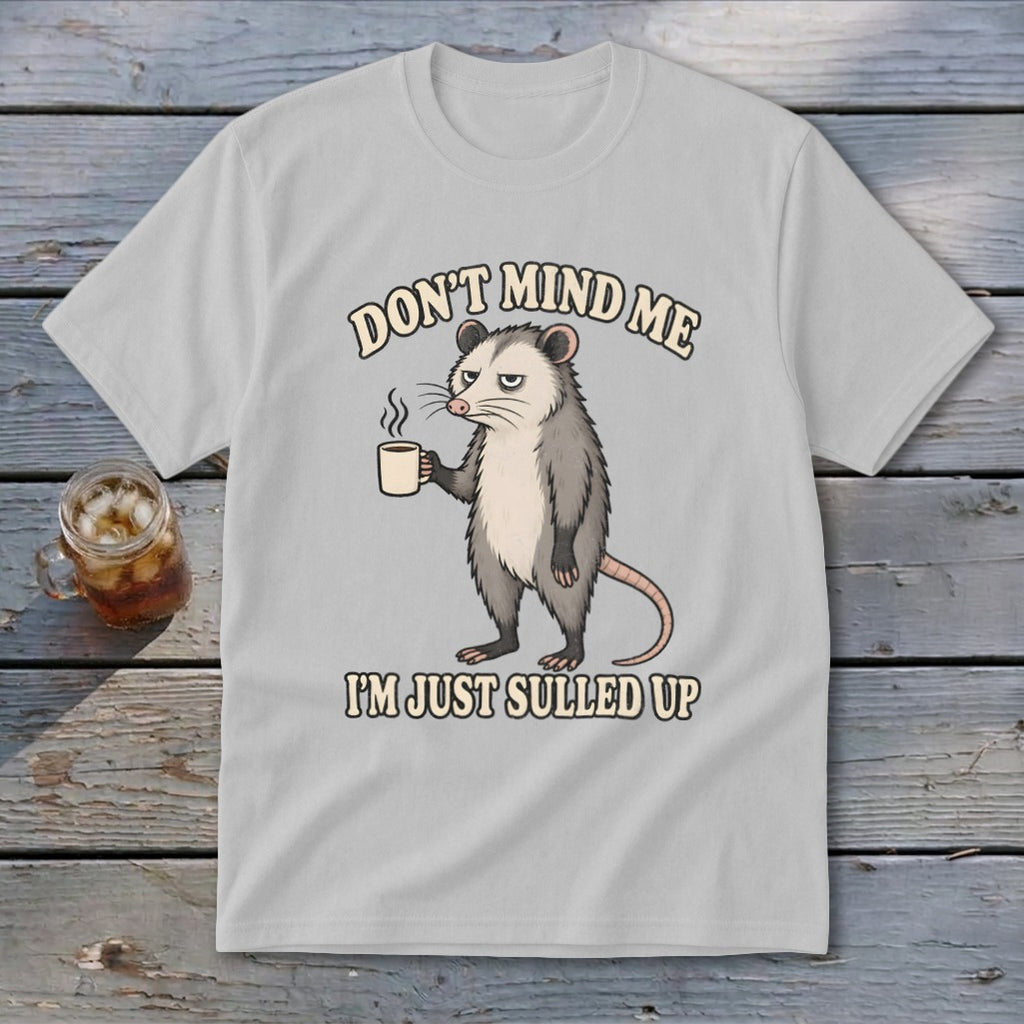T-shirt with possum holding coffee mug, "DON'T MIND ME I'M JUST SULLED UP."