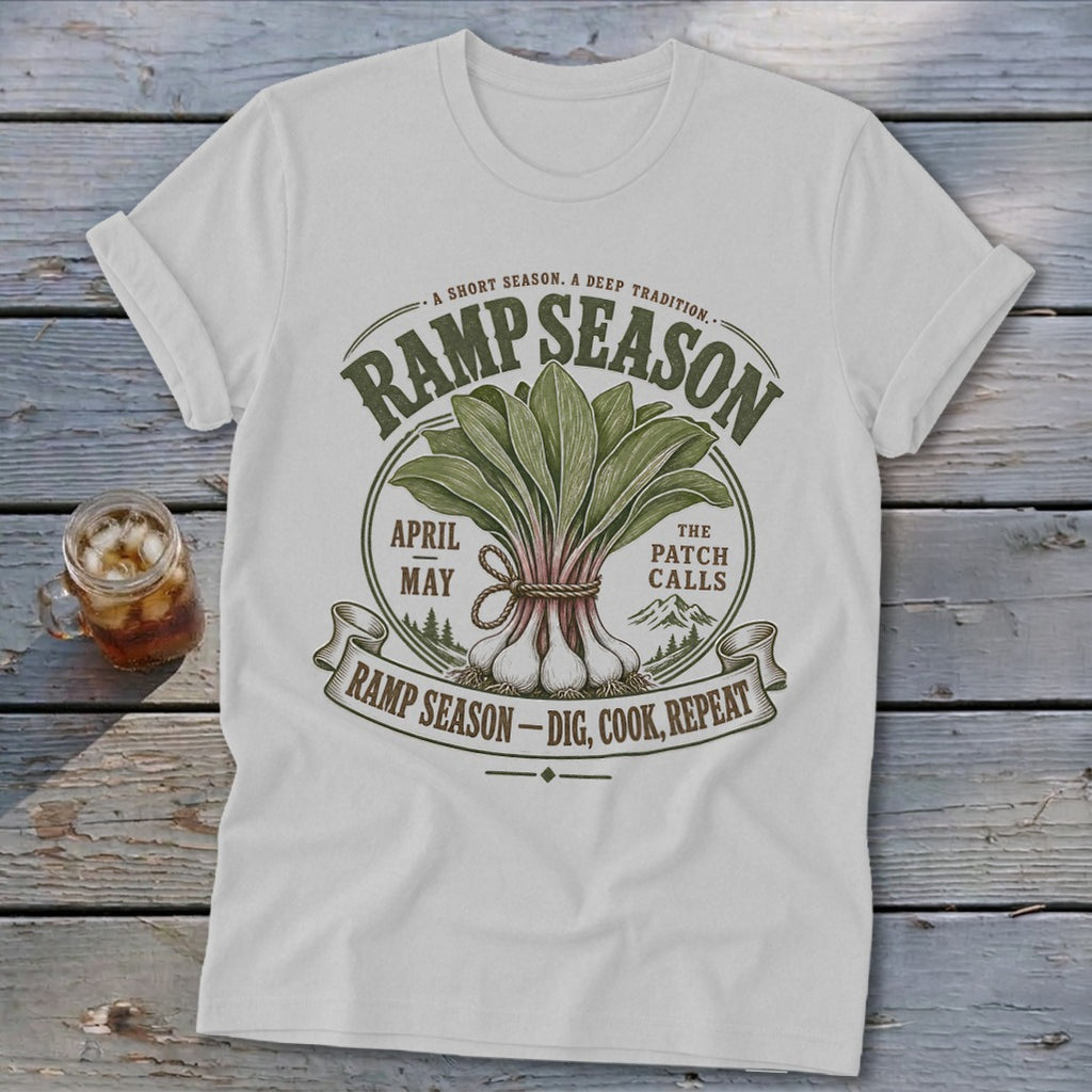 T-shirt with "Ramp Season" graphic featuring ramps, April, May, and "Dig, Cook, Repeat."