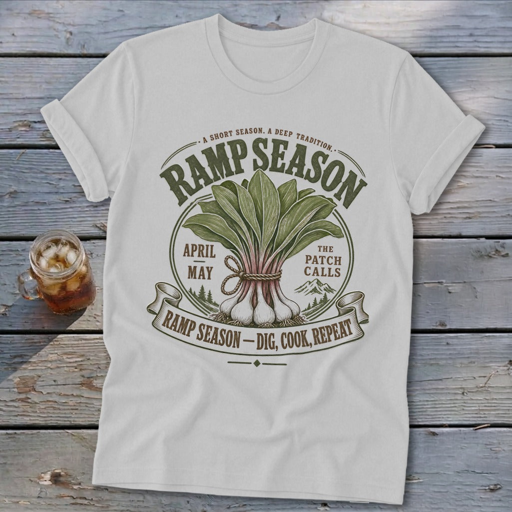 T-shirt with "Ramp Season" graphic featuring ramps, April, May, and "Dig, Cook, Repeat."