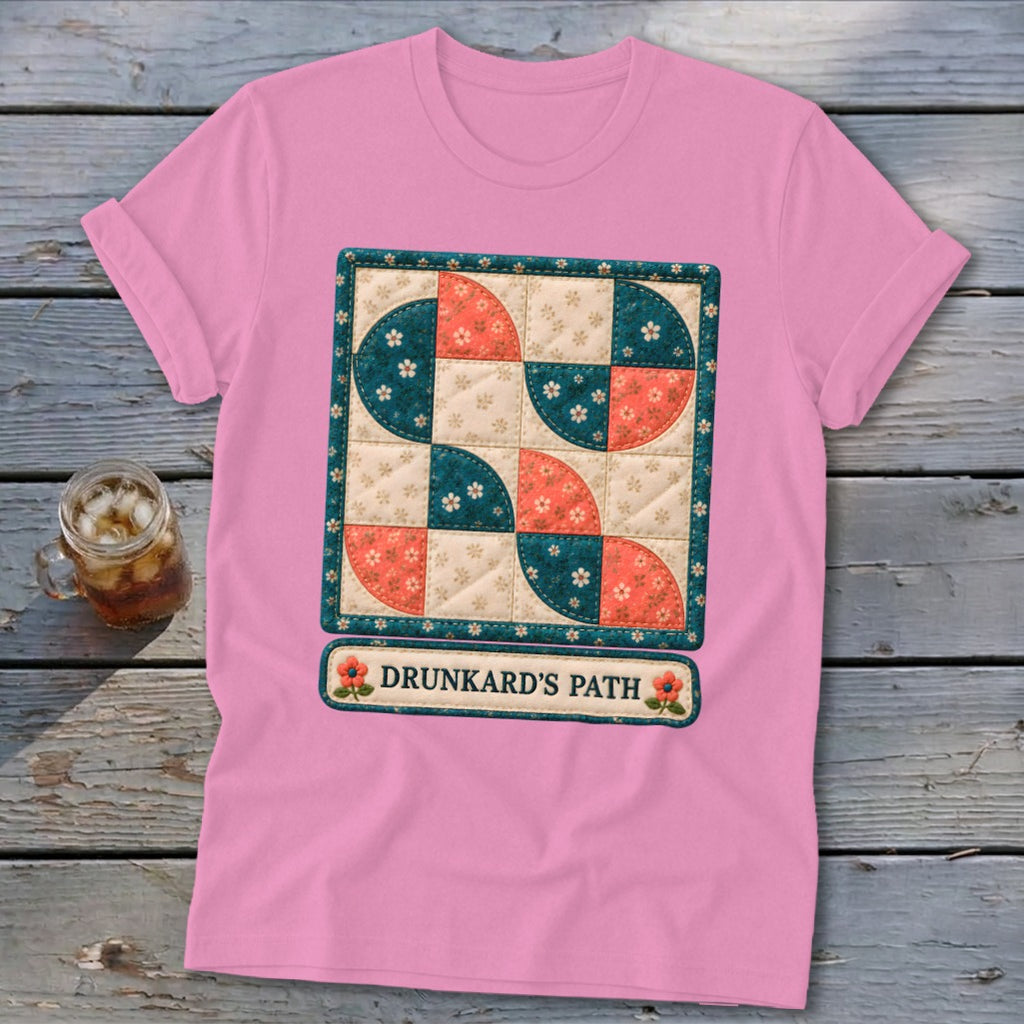 Pink t-shirt with a Drunkard's Path quilt pattern and text.