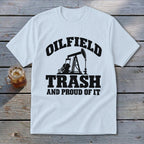 White t-shirt with "OILFIELD TRASH AND PROUD OF IT" and oil derrick graphic.