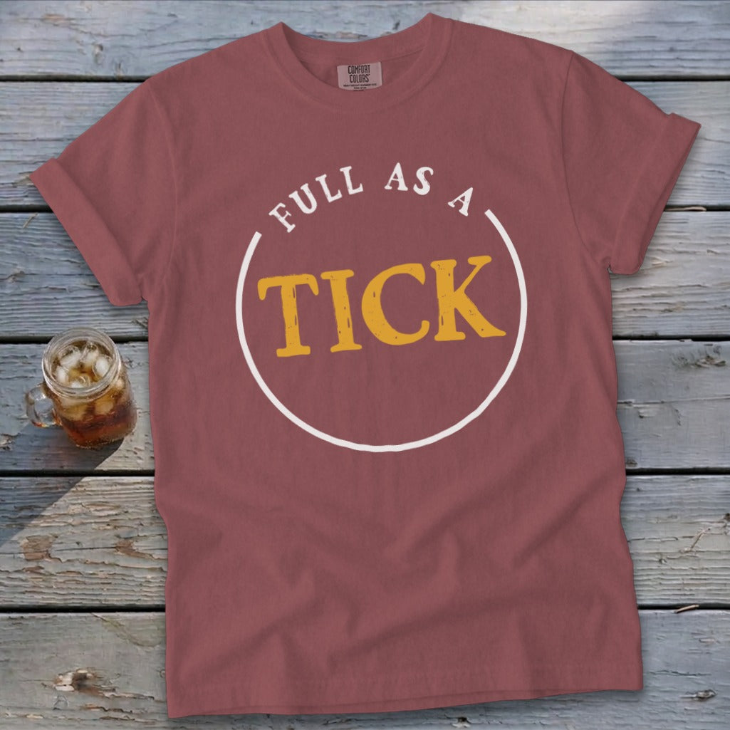 Maroon t-shirt with "FULL AS A TICK" text in yellow within a white circle.
