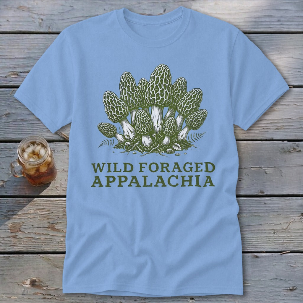 Light blue t-shirt with a green illustration of morel mushrooms and text.