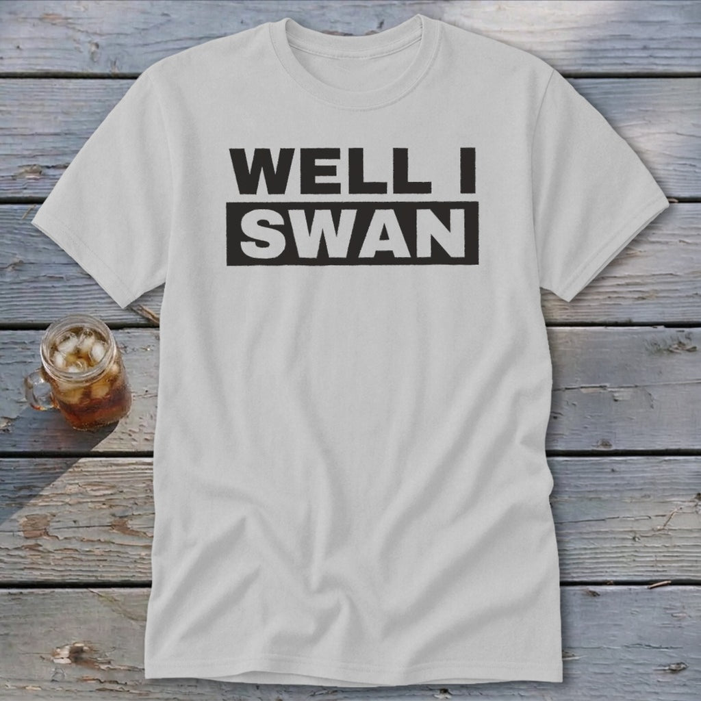 Light gray crewneck t-shirt featuring bold black text that reads WELL I SWAN.