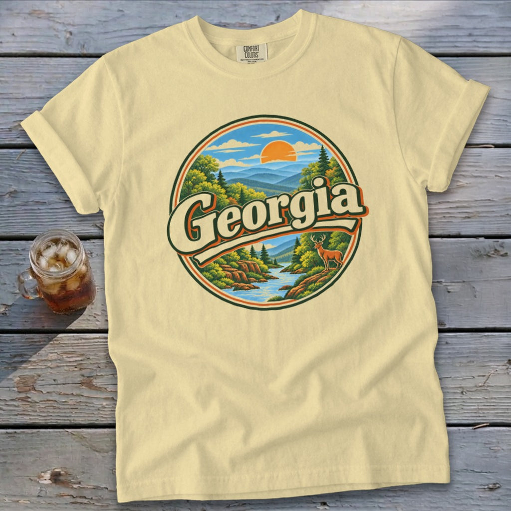 Cream t-shirt with circular Georgia landscape graphic featuring a deer.