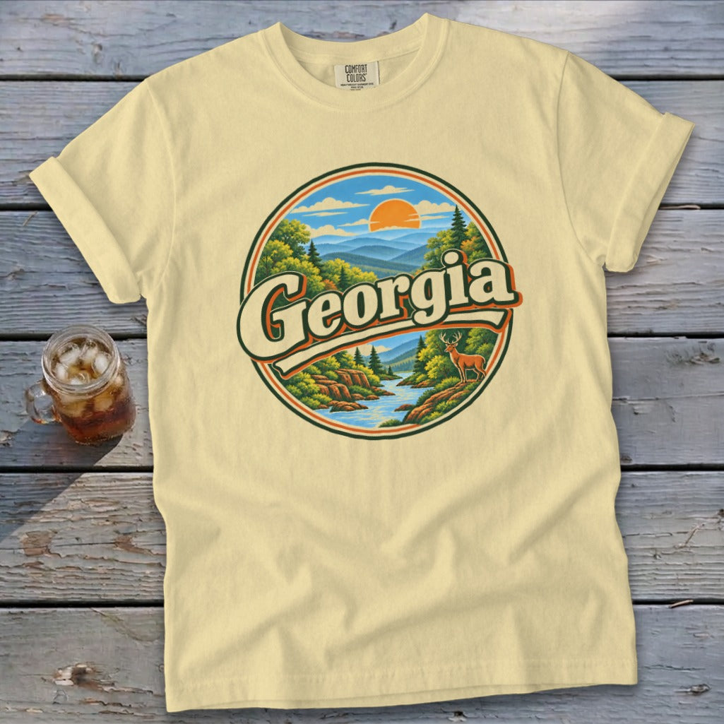 Cream t-shirt with circular Georgia landscape graphic featuring a deer.
