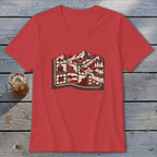 Red V-neck t-shirt featuring a graphic print of a patchwork quilt landscape with mountains.
