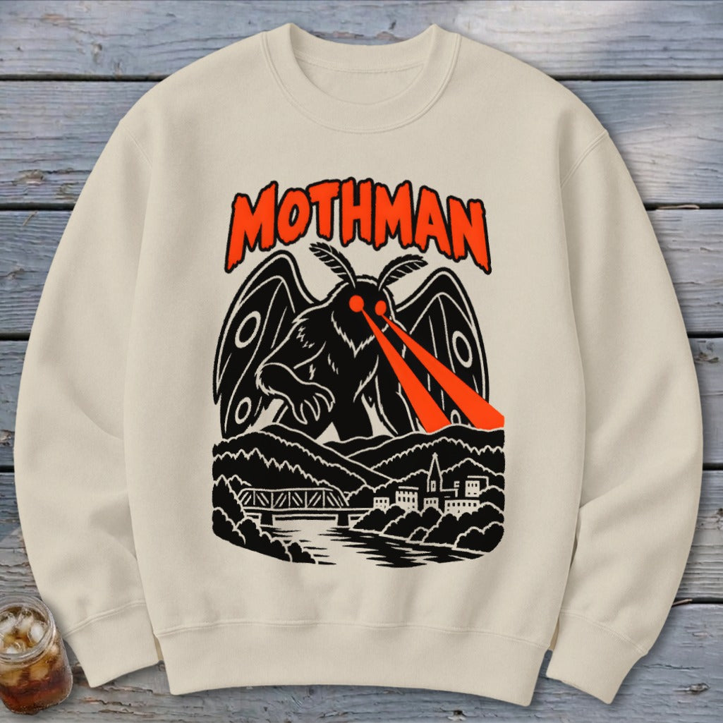 Cream sweatshirt with black Mothman graphic and "MOTHMAN" text.