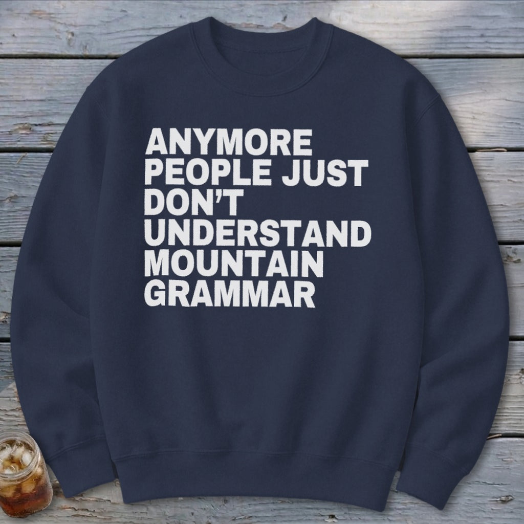 Navy crewneck sweatshirt with white text reading "Anymore people just don't understand mountain grammar."