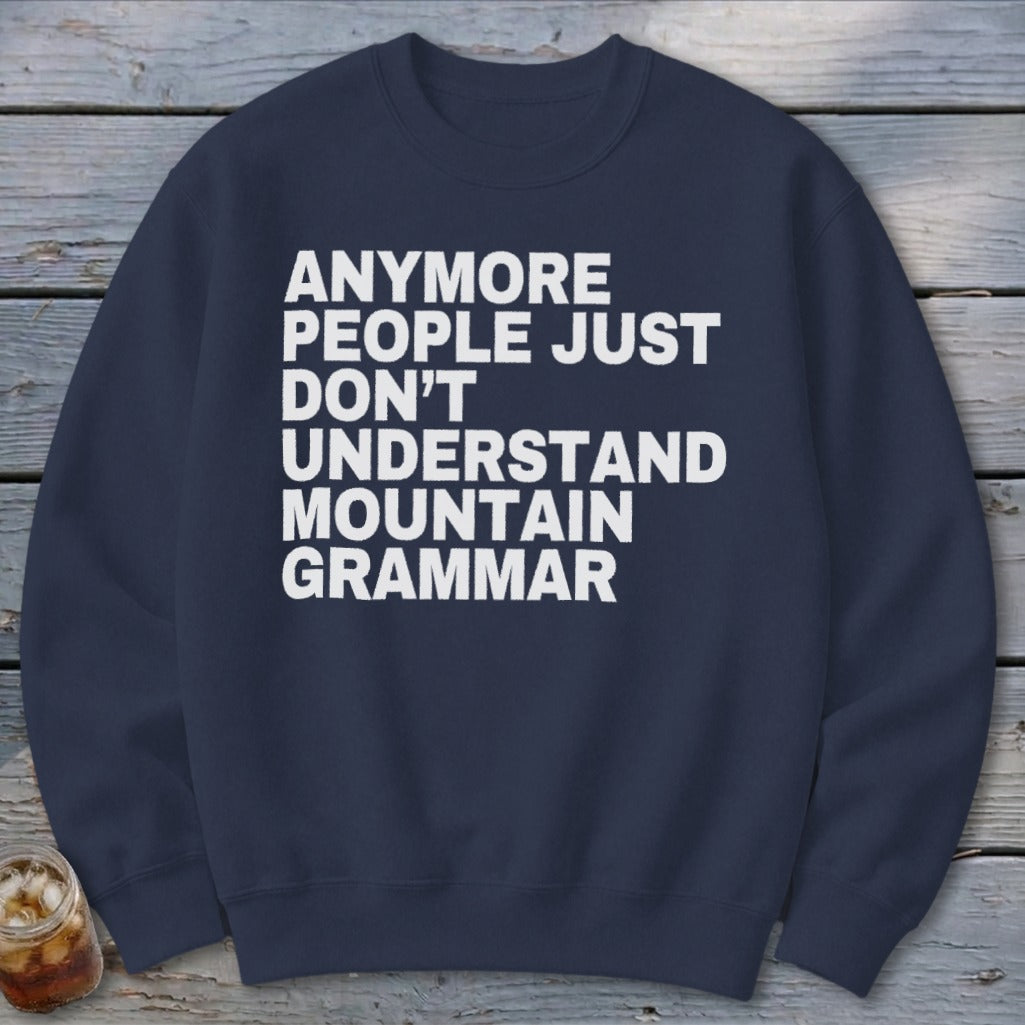 Navy crewneck sweatshirt with white text reading "Anymore people just don't understand mountain grammar."