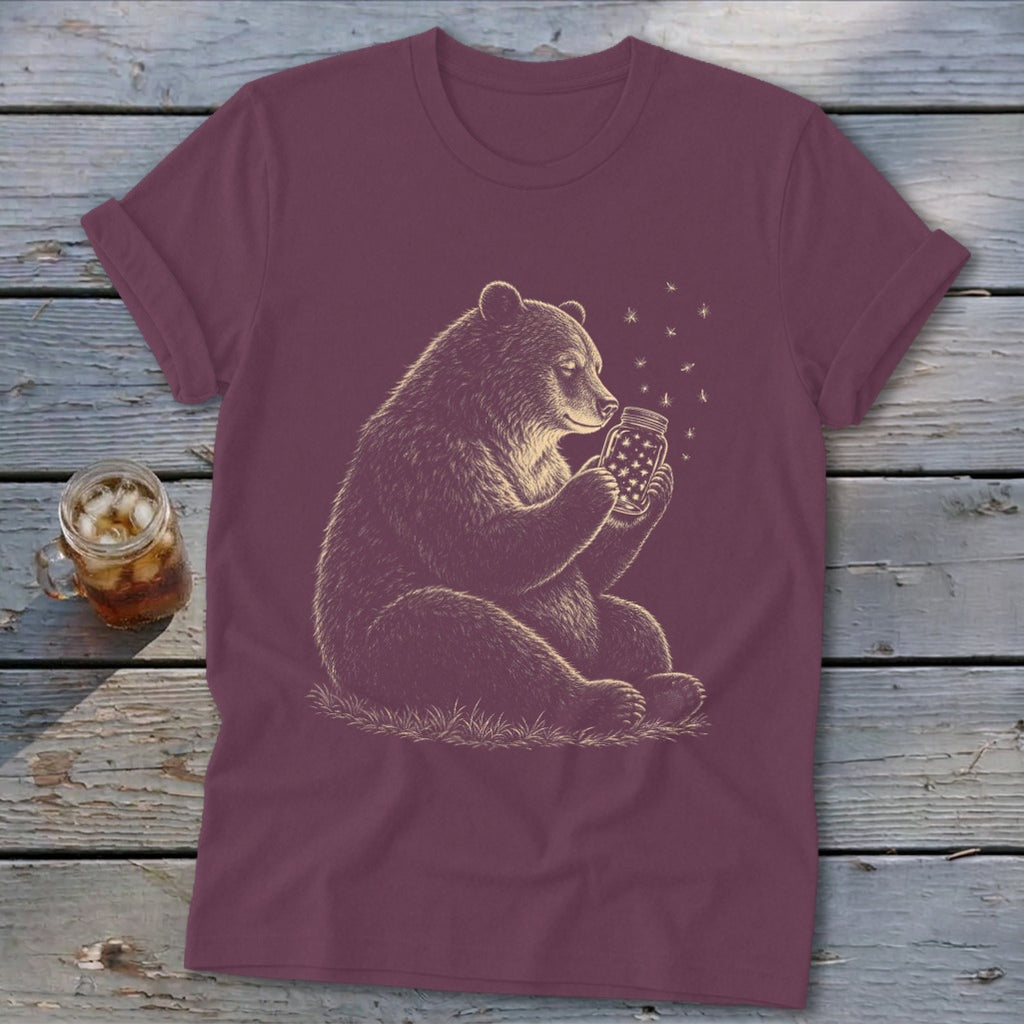 Bear holding a mason jar filled with stars, with fireflies floating around.
