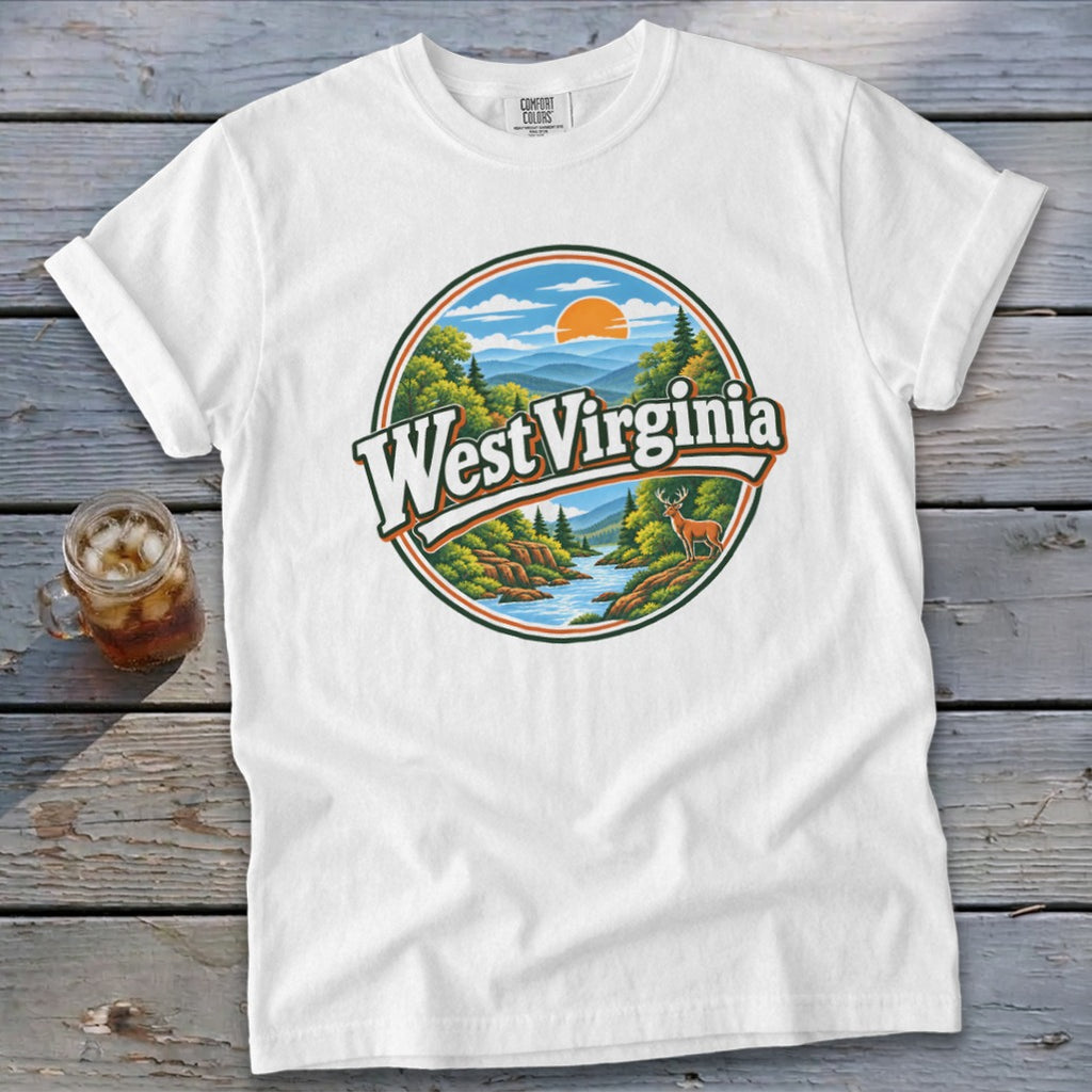 White t-shirt featuring a circular nature graphic with "West Virginia" text and a deer.