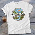 White t-shirt featuring a circular nature graphic with "West Virginia" text and a deer.