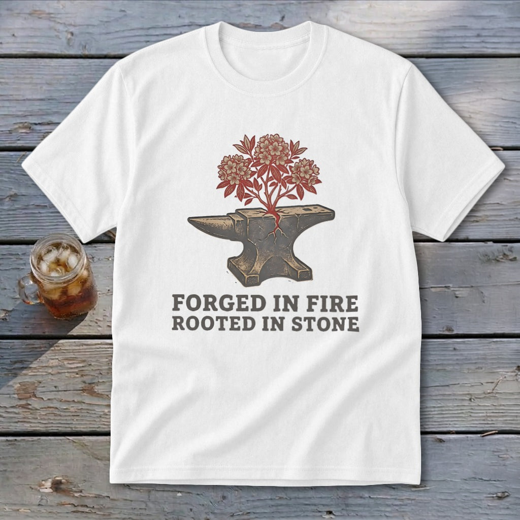White t-shirt with anvil graphic and text "Forged in Fire Rooted in Stone".