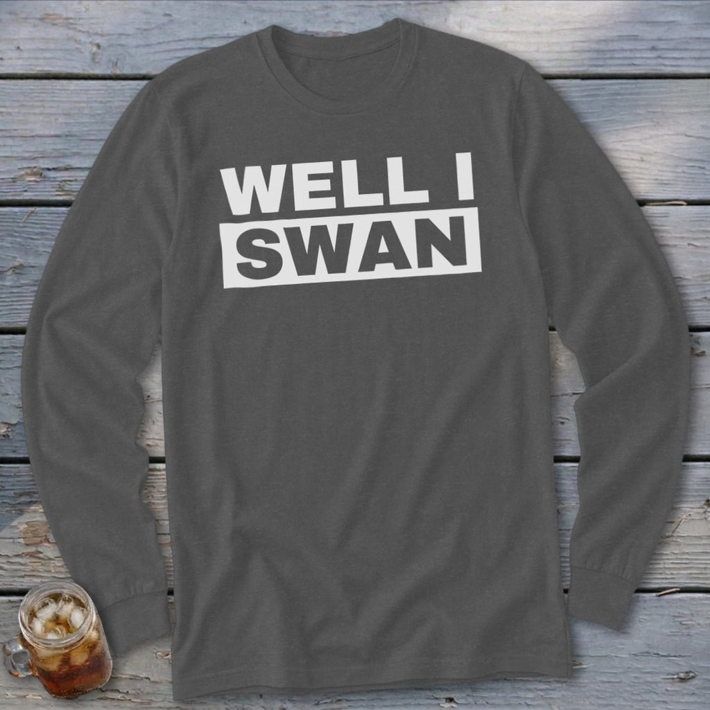 Dark grey long-sleeved t-shirt with white block text reading "WELL I SWAN" on the chest.