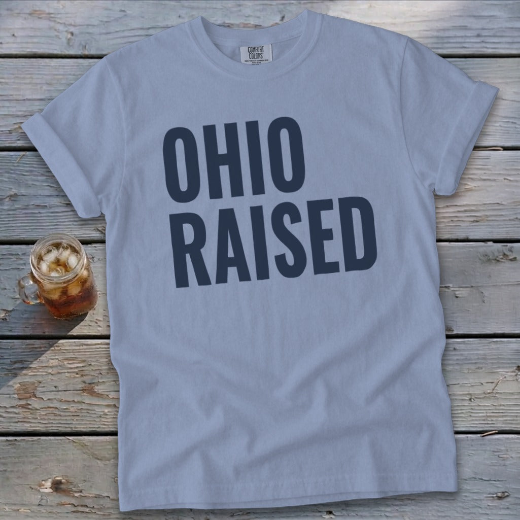Light blue t-shirt with "OHIO RAISED" text and a mug of iced tea.