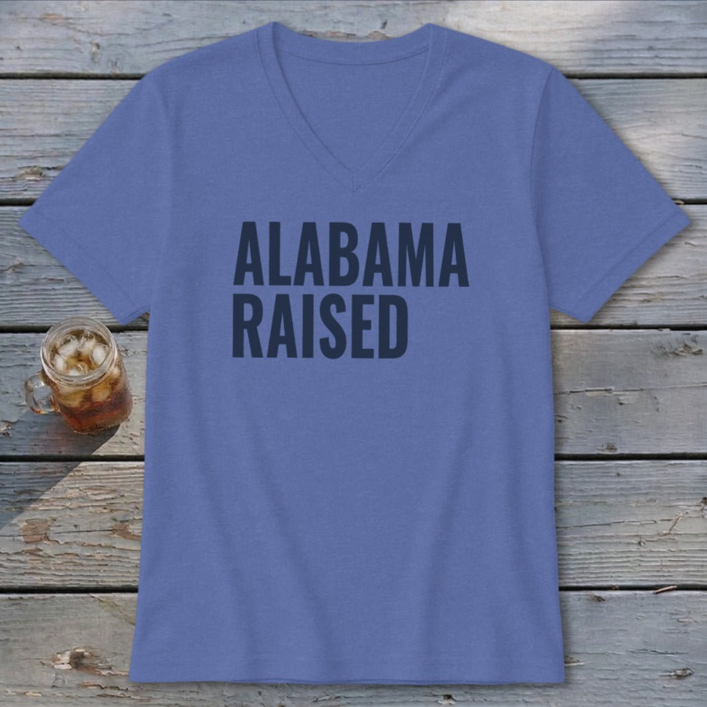 Periwinkle v-neck t-shirt with "ALABAMA RAISED" text and a glass of iced tea.
