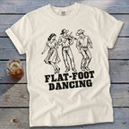T-shirt with black line art of flat-foot dancers and "FLAT-FOOT DANCING" text.