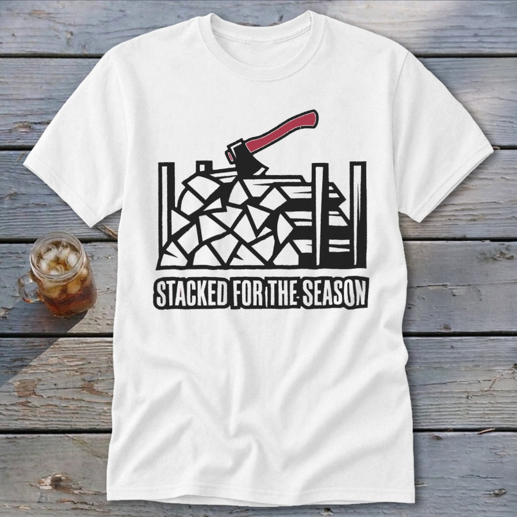 White t-shirt with graphic of stacked firewood, an axe, and text "STACKED FOR THE SEASON."