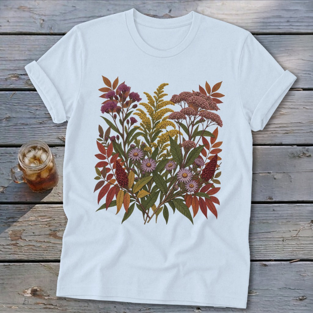 White t-shirt with a dense floral bouquet print featuring autumn colors.