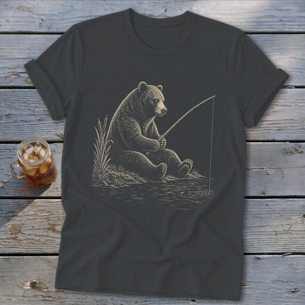 T-shirt with line drawing of a bear fishing by the water.