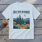 Light blue t-shirt featuring a green graphic of Dolly Sods Wilderness with pine trees and mountains.