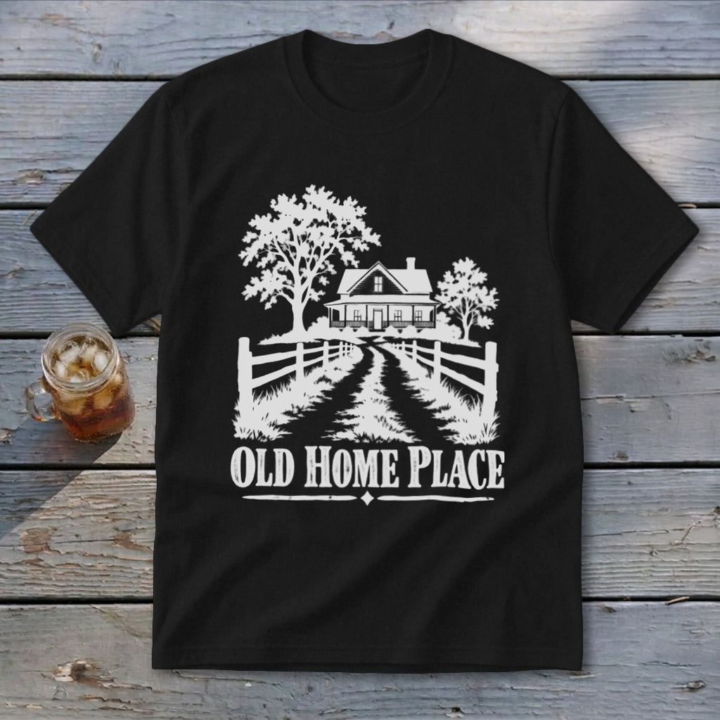 Black t-shirt with white graphic of a house, trees, fence, and text OLD HOME PLACE.