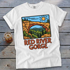 White t-shirt with cartoon graphic of Red River Gorge and text.