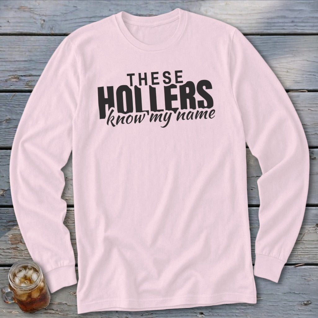 Pink long sleeve shirt with "THESE HOLLERS know my name" text.