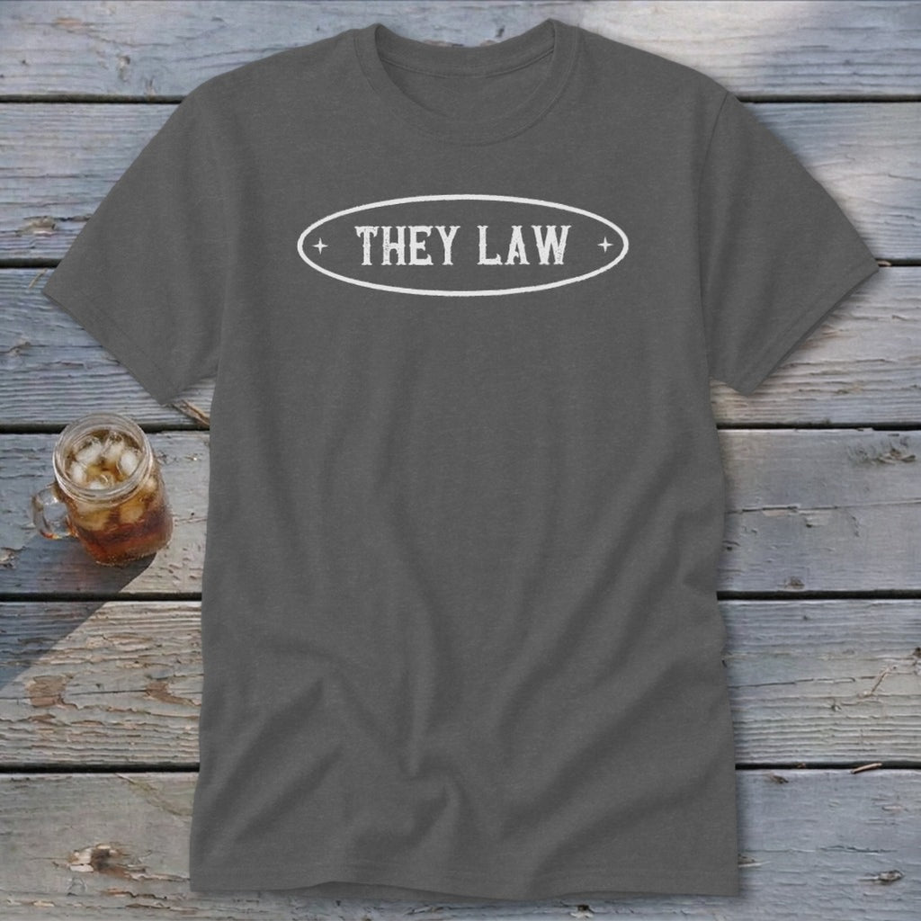 Dark gray t-shirt with white text "THEY LAW" in an oval emblem.