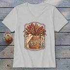 T-shirt graphic with barrel overflowing with sorghum stalks and the word "Sorghum".