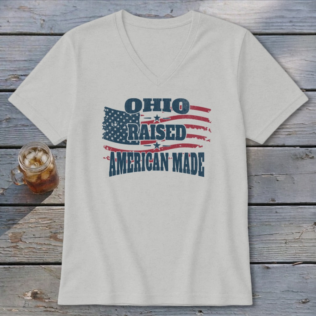 Light gray V-neck t-shirt featuring a distressed American flag design with the text Ohio Raised American Made.