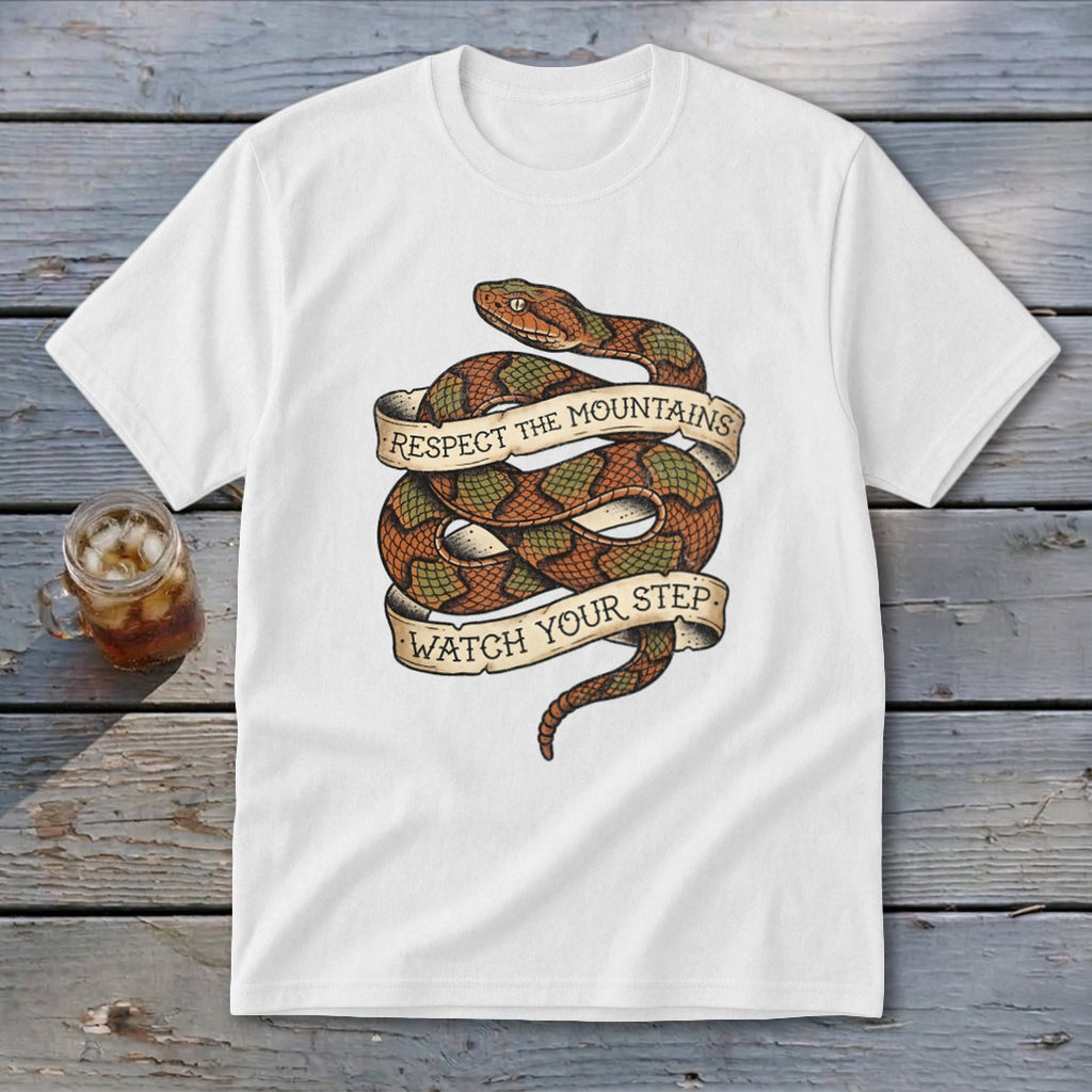 White t-shirt with coiled snake graphic and banners saying "Respect the Mountains" and "Watch Your Step".