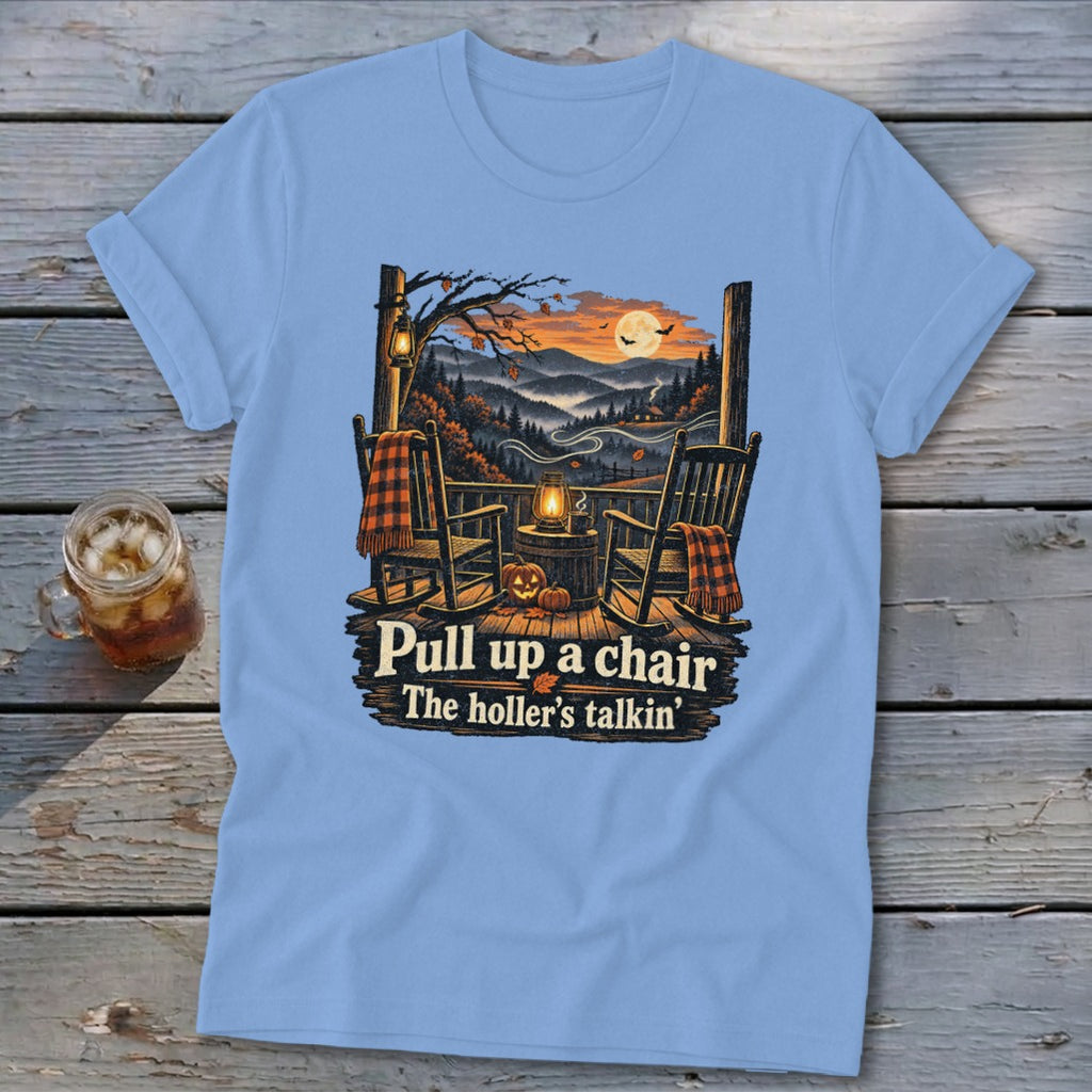 Light blue t-shirt with rocking chairs on a porch and "Pull up a chair The holler's talkin'" text.