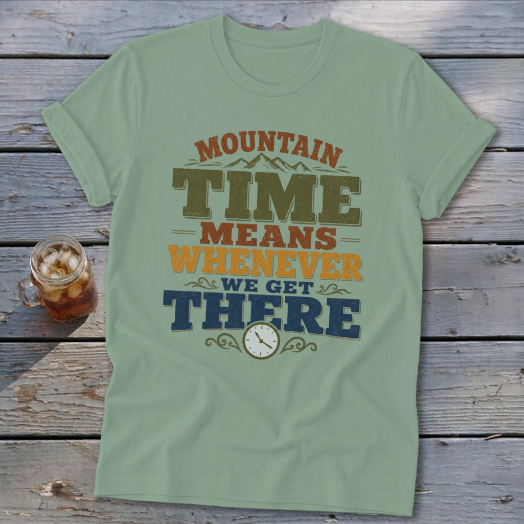 Light green t-shirt with "Mountain Time Means Whenever We Get There" text and a clock.
