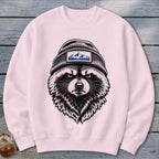 Pink crewneck sweatshirt with a graphic of an angry raccoon wearing a beanie with mountains.