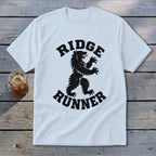 White t-shirt with black bear graphic and text "RIDGE RUNNER"