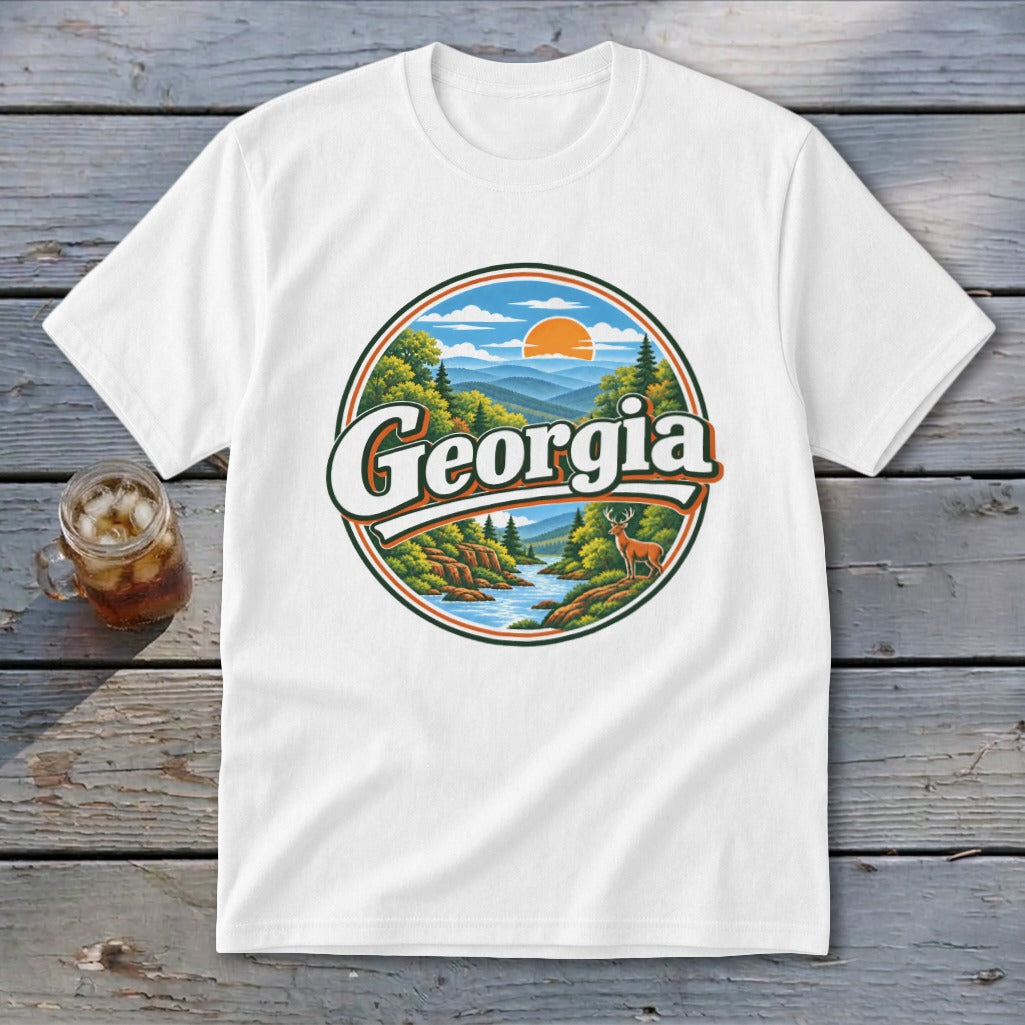 White t-shirt with circular Georgia landscape graphic featuring mountains, river, deer, and sun.