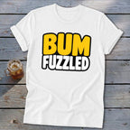 White short-sleeved t-shirt with the text Bum Fuzzled printed in yellow and white on the chest.