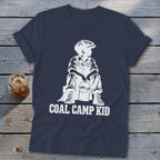 Navy t-shirt with white graphic of a seated child and text "COAL CAMP KID".
