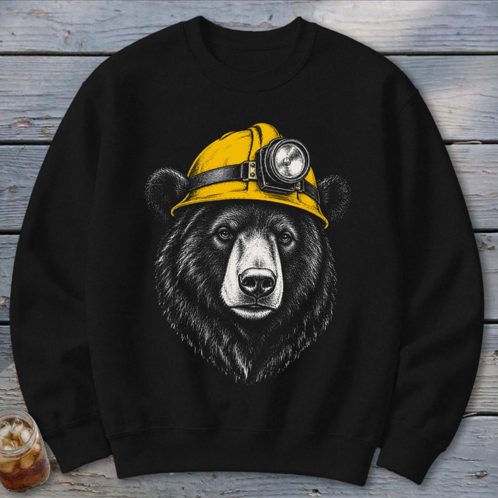 Black sweatshirt with a sketch of a bear wearing a yellow hard hat with a headlamp.