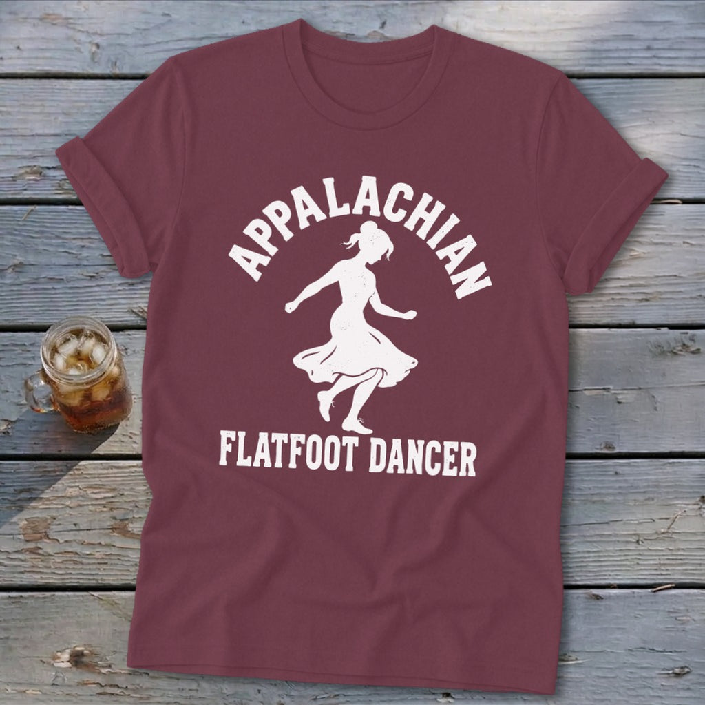 Maroon t-shirt with a white graphic of a dancing woman and text reading Appalachian Flatfoot Dancer.