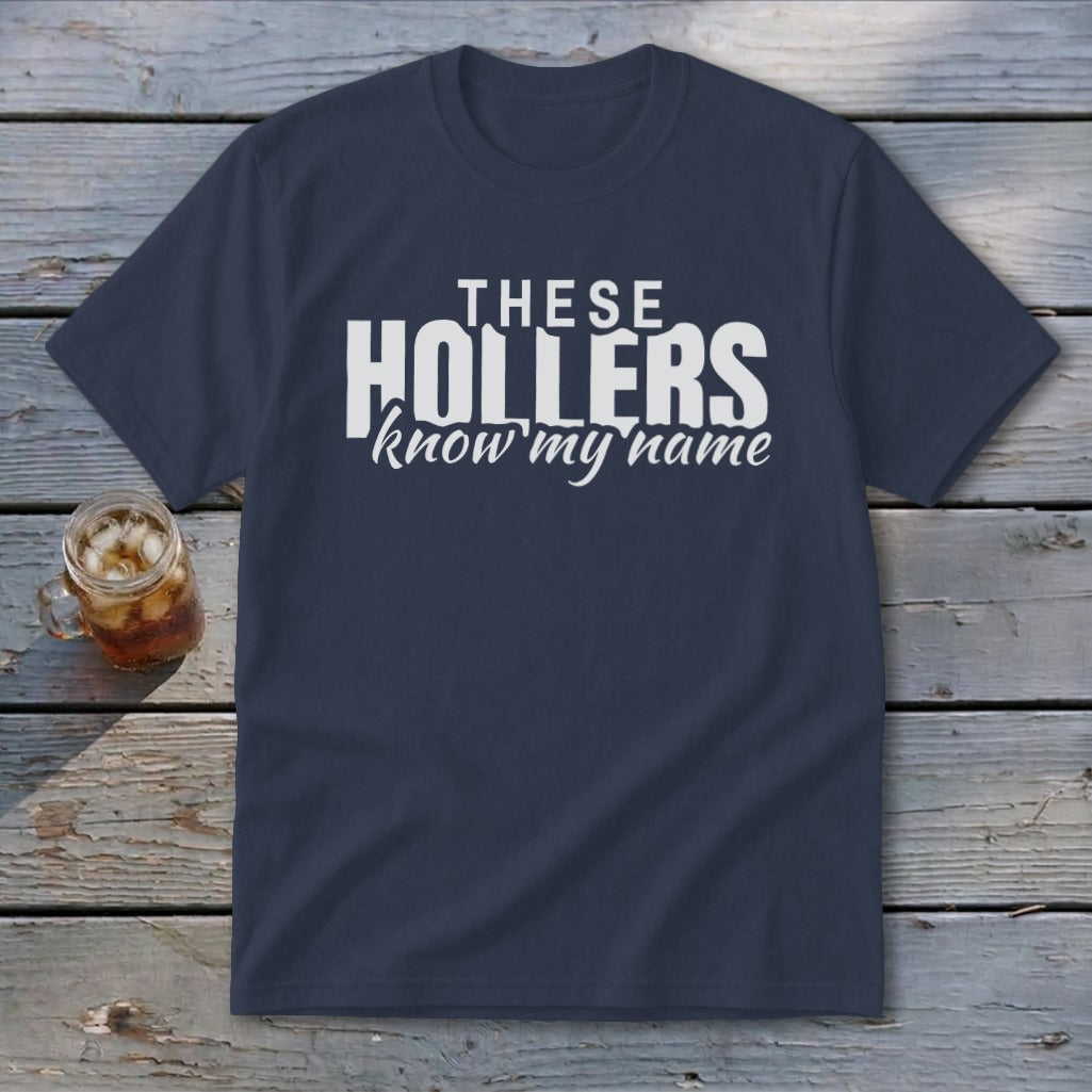 Navy t-shirt with white text "THESE HOLLERS know my name".