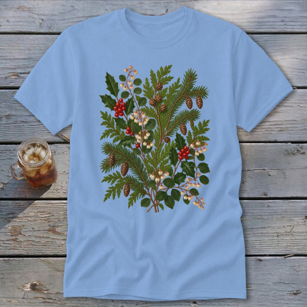 Light blue t-shirt with a dense botanical print of pine sprigs, holly, berries, and pinecones.