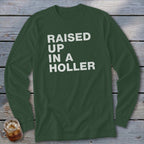 Long sleeve t-shirt with white text "RAISED UP IN A HOLLER".